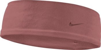 Ein rosafarbener Nike-Schweißband mit Swoosh-Logo an der Seite.