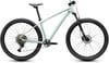 Hellgrünes Mountainbike mit Federung und Scheibenbremsen.