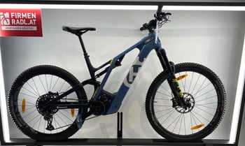 Blaues Husqvarna E-Bike mit Federung und Logo auf dem Rahmen.
