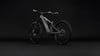 Graues E-Mountainbike mit breiten Reifen und Federung.