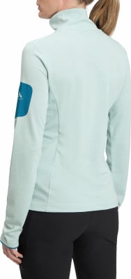Rückansicht einer hellblauen Damenjacke mit einem dunkelblauen Ärmeldetail. Rückansicht einer hellblauen Damenjacke mit einem dunkelblauen Ärmeldetail.