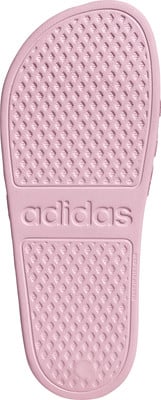 Rosa Adidas-Sohle mit Rautenmuster und Logo. Rosa Adidas-Sohle mit Rautenmuster und Logo.