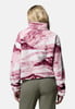 Zadní pohled na dámskou fleecovou bundu s růžovo-bílým vzorem tie-dye.